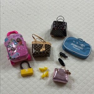Barbie purses and luggage.